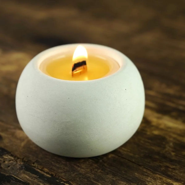 Soy scented candle in concrete